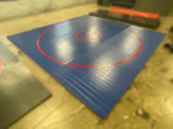 AK Athletic Equipment Wrestling Mats CLEARANCE 14' X 14' X 1 3/8" Roll Up Wrestling Mat - BLUE WITH RED CIRCLES