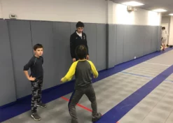 AK Athletic Equipment Custom Wood Backed Gym Wall Padding Panels 2' X 5'