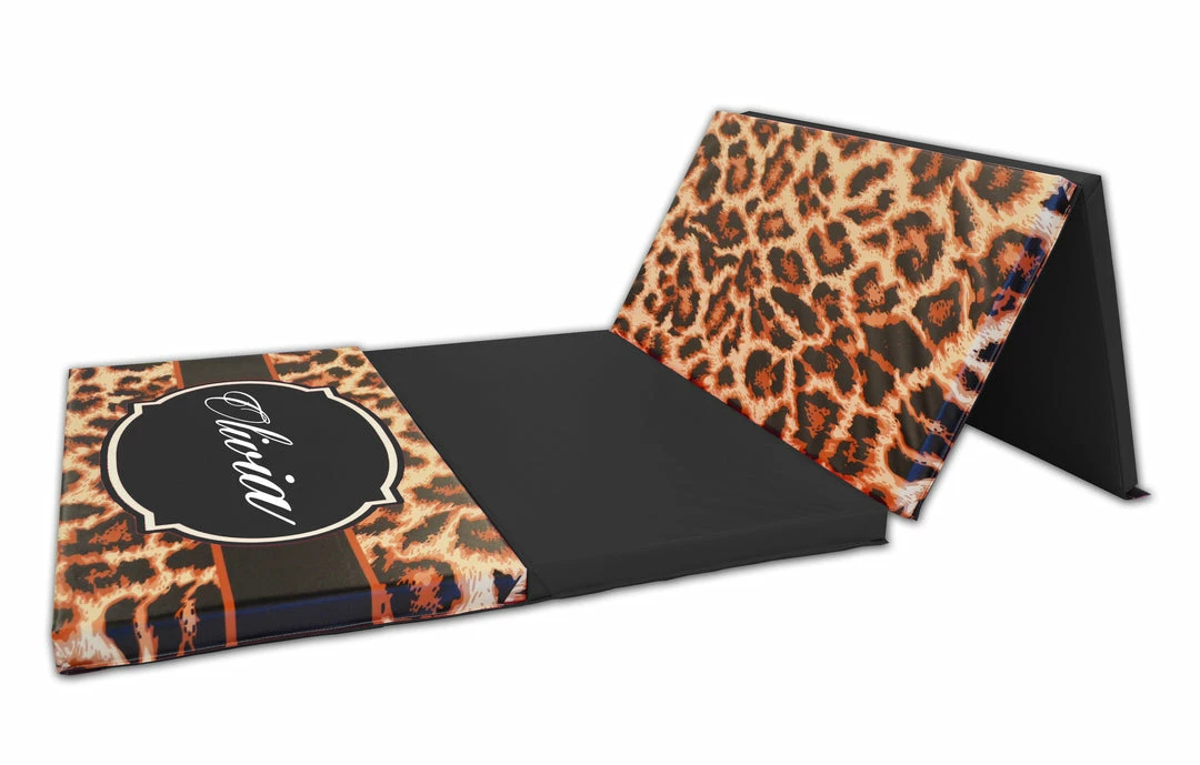 AK Athletic Equipment Leopard Print Monogram 4' X 8' Folding Gymnastics Mat 1 AK Athletic Equipment Leopard Print Monogram 4' X 8' Folding Gymnastics Mat